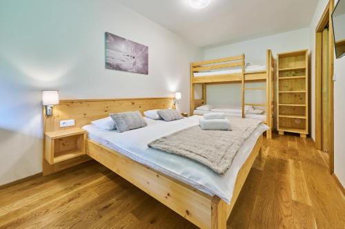 Postel nebo postele na pokoji v ubytování Post Residence