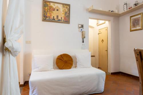Ένα ή περισσότερα κρεβάτια σε δωμάτιο στο Romana Living