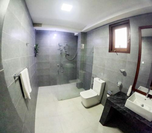 Ένα μπάνιο στο Mollusca Beach Villa