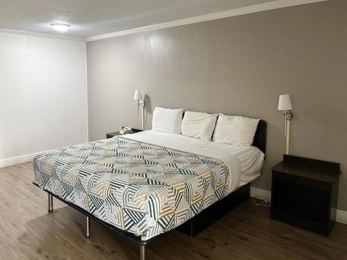 Кровать или кровати в номере Motel 6-Opelousas, LA