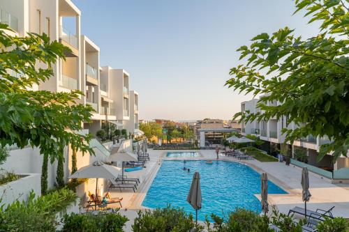 an image of a swimming pool at a hotel at SithoniaRS Emerald Luxury Apartment in Nikiti