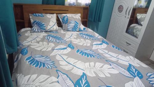 Postel nebo postele na pokoji v ubytování Appartement Fitahiana famille