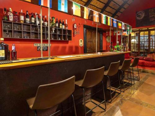 Lounge atau bar di Royal Bakoena Hamiltonparks Country Lodge
