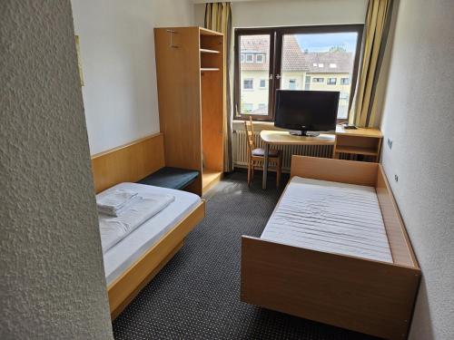 Katil atau katil-katil dalam bilik di Hotel Mautner Airport und Messehotel