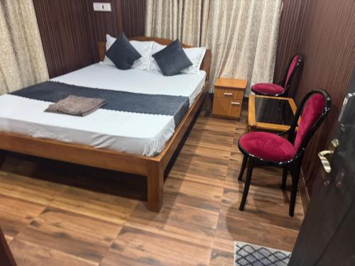 Ένα ή περισσότερα κρεβάτια σε δωμάτιο στο Aama Home Stay