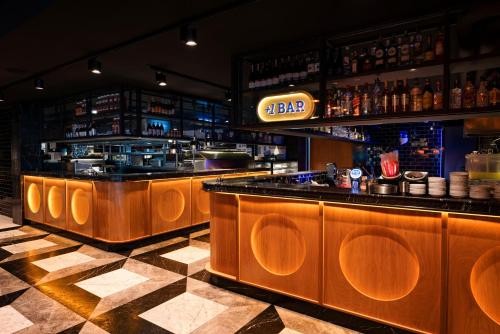 a restaurant with a bar with a counter top at Fier Life Center in Kayseri