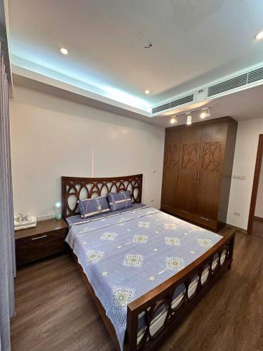 Ένα ή περισσότερα κρεβάτια σε δωμάτιο στο Bai Chay Apartment