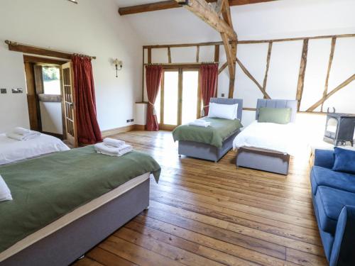 Ένα ή περισσότερα κρεβάτια σε δωμάτιο στο Stud Farm House