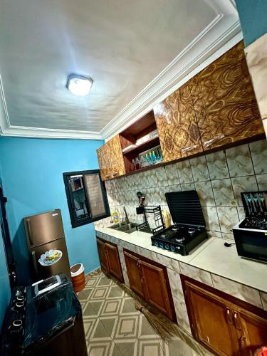 Kuchyň nebo kuchyňský kout v ubytování Residence Elysa de Yaounde Messassi