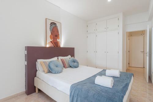 Katil atau katil-katil dalam bilik di Central Apartment by Ocvillas