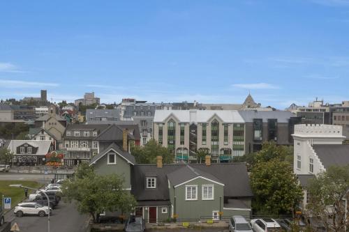 a view of a city with houses and cars at Berg Apartments in Reykjavík
