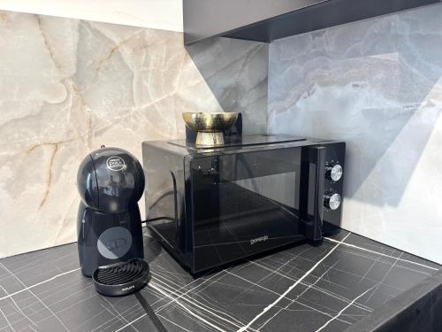 Η κουζίνα ή μικρή κουζίνα στο OPUS Boutique apartmani