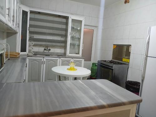 Dapur atau dapur kecil di شقق ابو يزن المفروشة