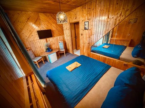 Postel nebo postele na pokoji v ubytování Motel Charlie