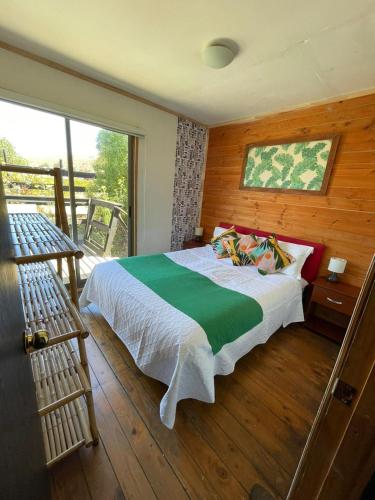 Postel nebo postele na pokoji v ubytování Lodge Los Bosques