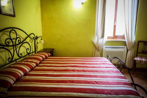 Ένα ή περισσότερα κρεβάτια σε δωμάτιο στο Hotel Casale 900