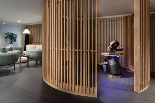 a room with a wall with bamboo dividers at JW Marriott Tampa Water Street in Tampa