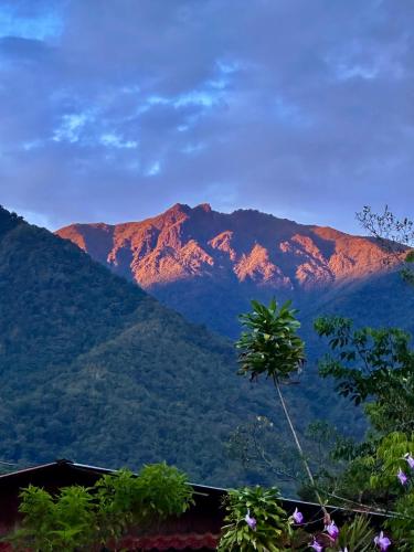a view of the mountains in the distance at Hotel de Montaña El Pelicano in San Isidro