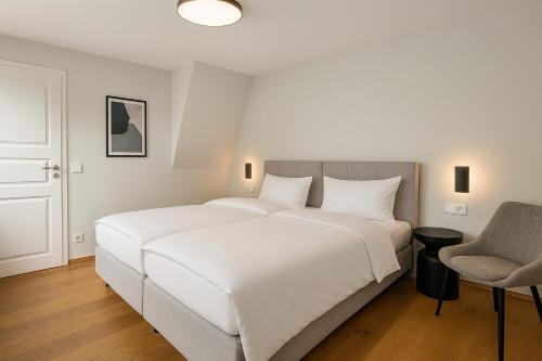 Ένα ή περισσότερα κρεβάτια σε δωμάτιο στο MYA Weinland Hotel Kobern-Gondorf