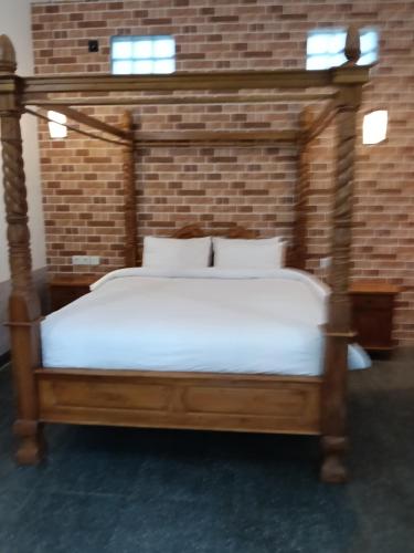 Ένα ή περισσότερα κρεβάτια σε δωμάτιο στο ari sari villa