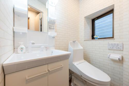 Un baño de 立川ミモザハウス