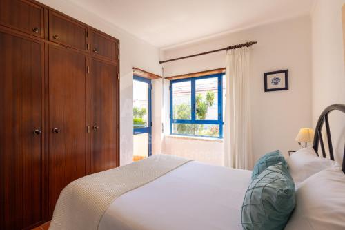 Postel nebo postele na pokoji v ubytování Casa do Sol by AcasaDasCasas