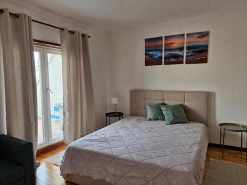 Postel nebo postele na pokoji v ubytování Vila Âncora Beach House 1