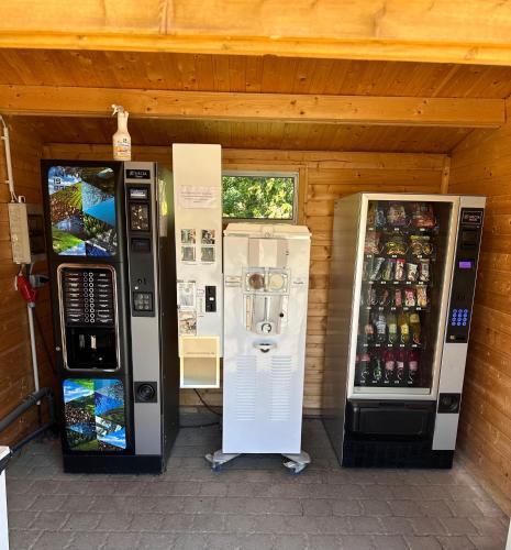 two vending machines are sitting next to each other at Pension auf dem Pferdehof Gut Greppin - mit WLAN, Sitzecke, Garten & kostenlosem Parken in Greppin