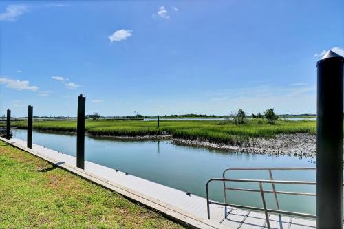 a body of water with poles in the middle at Masons View by Sea Scape Properties in Wrightsville Beach