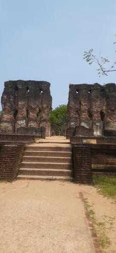 a set of steps leading up to a building at Green Bamboo House in Sigiriya