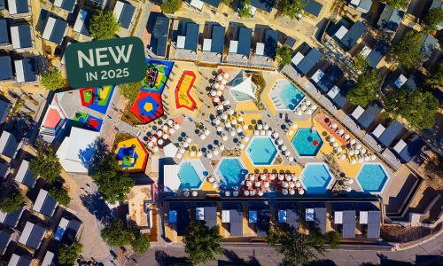 an overhead view of a pool in a city at Aminess Style Glamping Villas & Holiday Homes Atea in Njivice