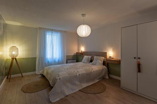 Ένα ή περισσότερα κρεβάτια σε δωμάτιο στο Downtown chic apartment in Pezenas