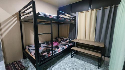 Palanda nebo palandy na pokoji v ubytování Cuarto De MSYB