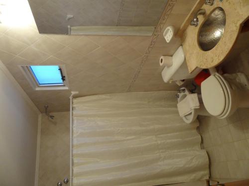 Koupelna v ubytování Hotel Holimasú