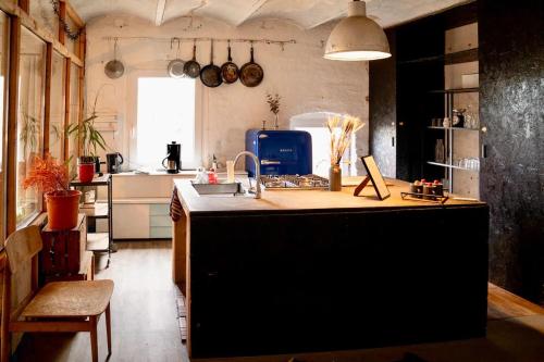 Η κουζίνα ή μικρή κουζίνα στο BarnLoft mit Whirlpool & Kamin
