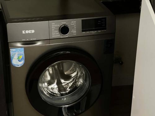 a washer and dryer in a room at Motives Inn Dilijan in Dilijan