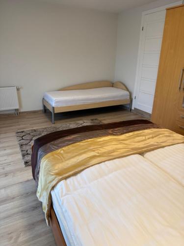 Un ou plusieurs lits dans un hébergement de l'établissement Florina namai