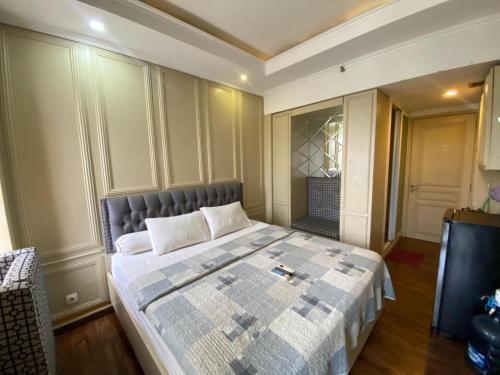 Ein Bett oder Betten in einem Zimmer der Unterkunft Vinsroom Dua