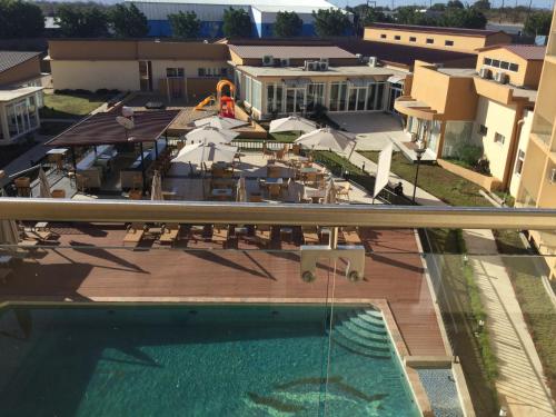 a view from the balcony of a hotel with a swimming pool at Hotel Inter Tete in Vila-de-Santiago-Maior