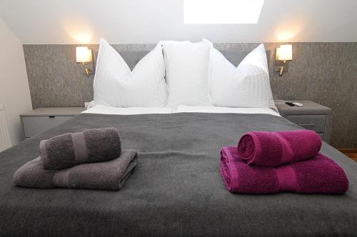 Una cama o camas en una habitación de Sió50fok apartmanház
