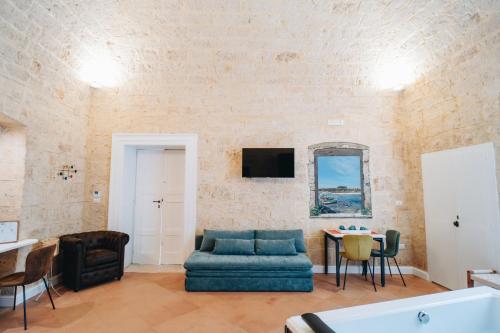 Bue Marino - Luxury Suitesにあるテレビまたはエンターテインメントセンター