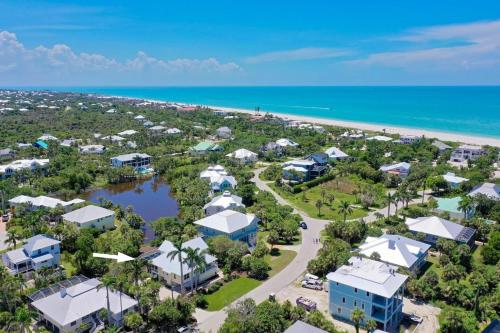 an aerial view of a resort and the beach at Sea Oats Oasis in Sanibel