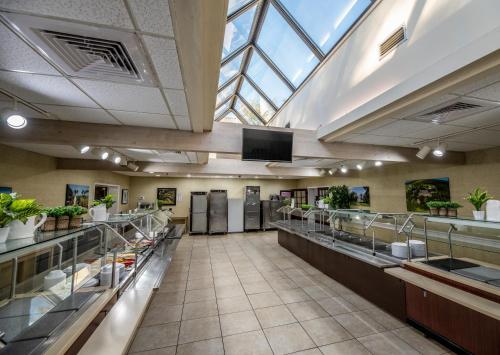 a large kitchen with a large skylight in a building at Epworth By The Sea in Saint Simons Island