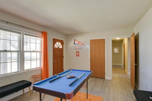 a living room with a pool table in it at Pet-Friendly Easley Family House with Game Room in Easley