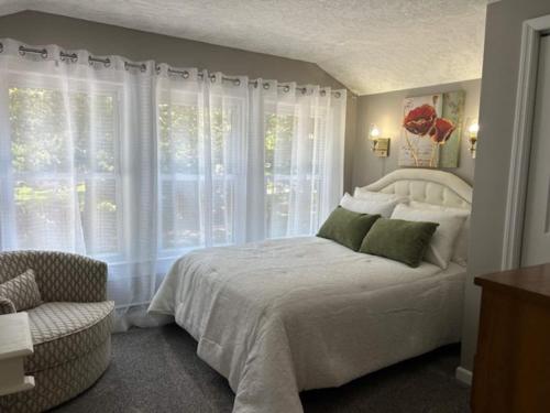 Postel nebo postele na pokoji v ubytování The Wheeler's House