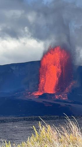 a large lava field with a red explosion at Shores at Waikoloa 132 Hale Kai in Waikoloa