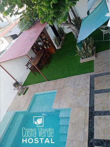 an aerial view of a resort with a swimming pool at Costa Verde Hostal in Manta
