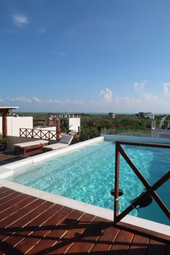 Piscina en o cerca de sunsteps Casa holbox