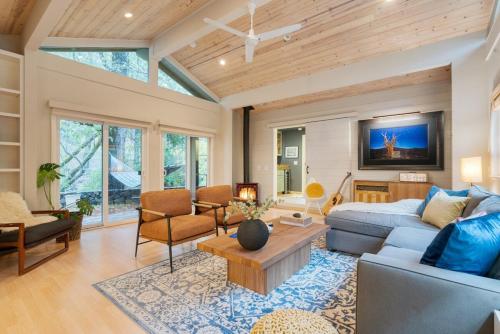a living room with a couch and a table at Sonoma Creek Haven in Kenwood