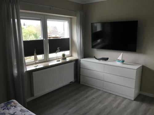 TV a/nebo společenská místnost v ubytování Ferienwohnung Mumm